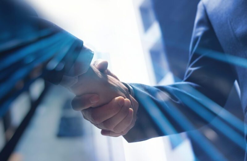 Businessmen,Making,Handshake,With,Partner,,Greeting,,Dealing,,Merger,And,Acquisition,